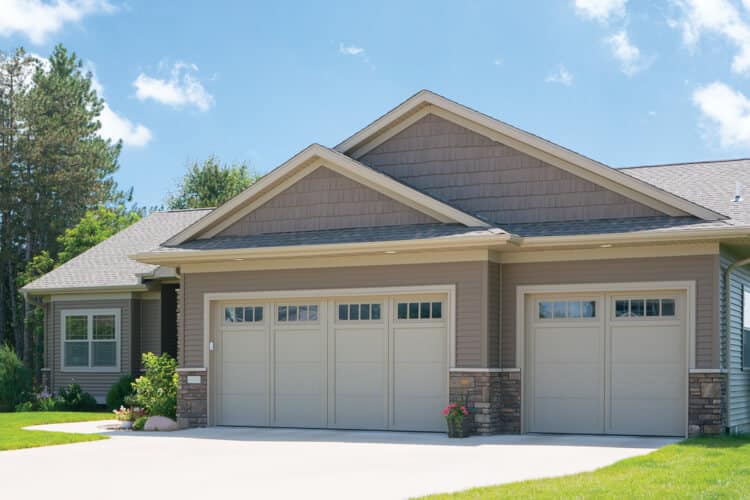 Our Courtyard Collection of Garage Doors Resemble the Elegant Wood Designs of Traditional Carriage House Doors