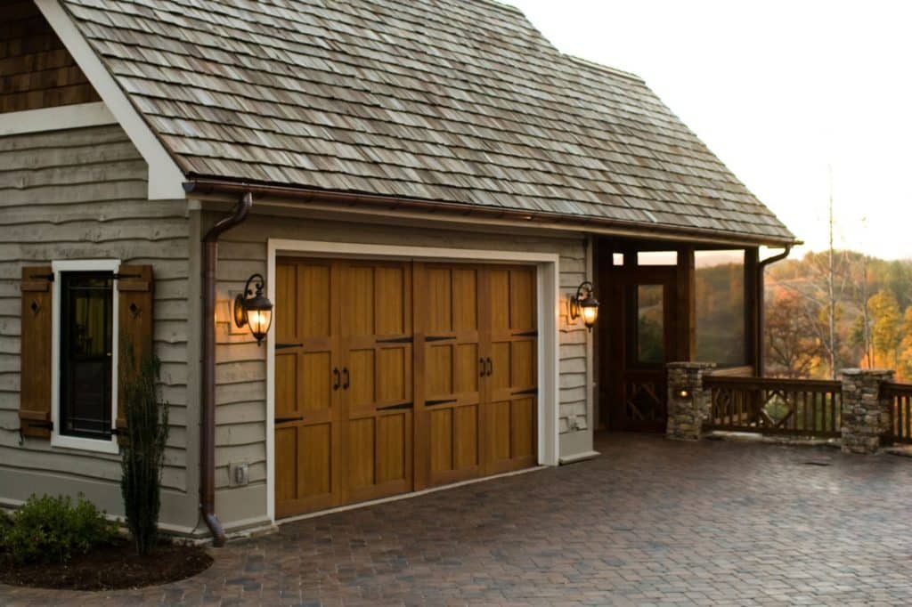 Different Commercial Garage Doors Include Sectional Steel Doors, Fire Doors, Roll-Up Doors, and Insulated Doors.