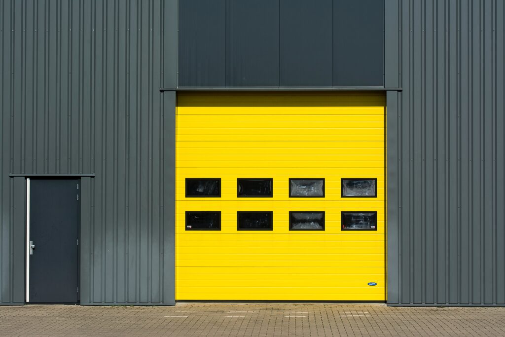 Image Text: 99.9% of the time, business owners should not use residential garage doors for commercial purposes.